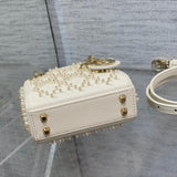 Handle and strap detail of elevated sleek women's handbag – women's designer-style accessory