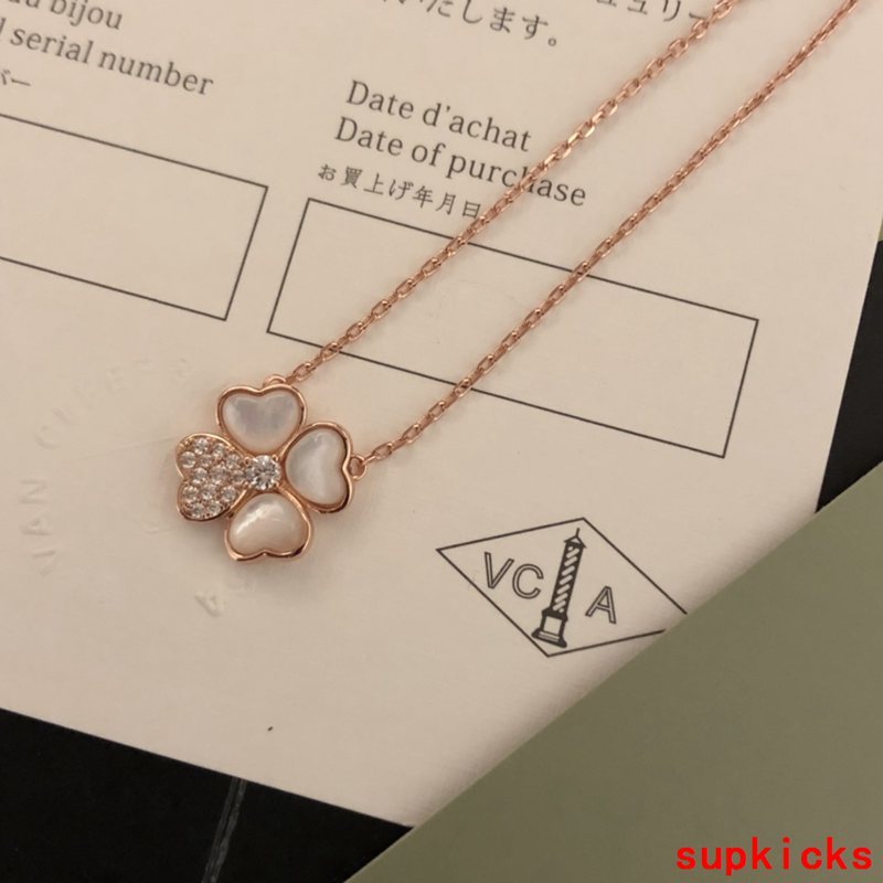 Lifestyle view of Van Cleef & Arpels unisex jewelry piece