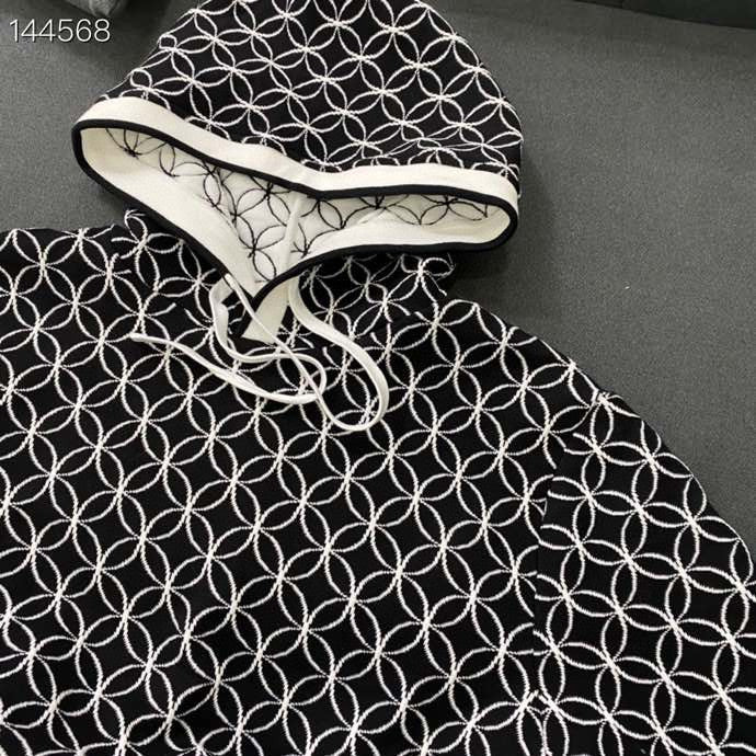 Flat lay presentation of Louis Vuitton luxury clothing with contemporary cut