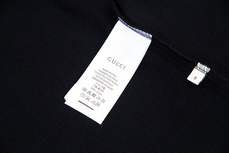 Close-up detail shot of Gucci luxury clothing with everyday silhouette