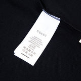 Close-up detail shot of Gucci luxury clothing with everyday silhouette