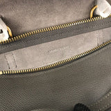 Handle and strap detail of everyday-luxe signature women's handbag – women's luxury accessory