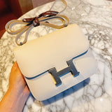 Side view of modernist structured handbag