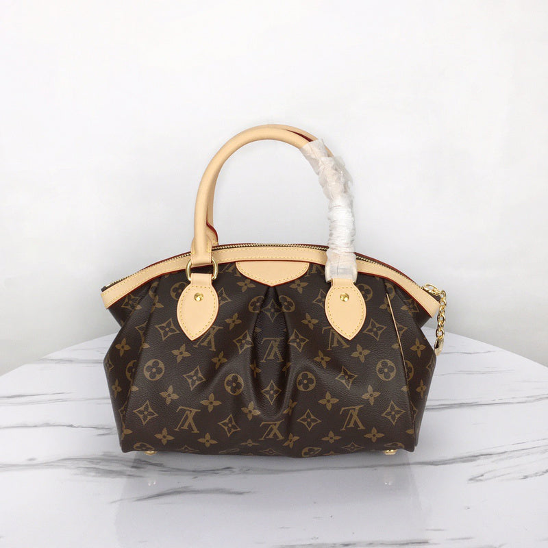 Side profile of chic everyday-luxe women's handbag – women's designer-style accessory