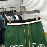 Close-up detail shot of Rhude luxury clothing with everyday silhouette