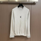 Front view of Louis Vuitton luxury clothing with signature branding