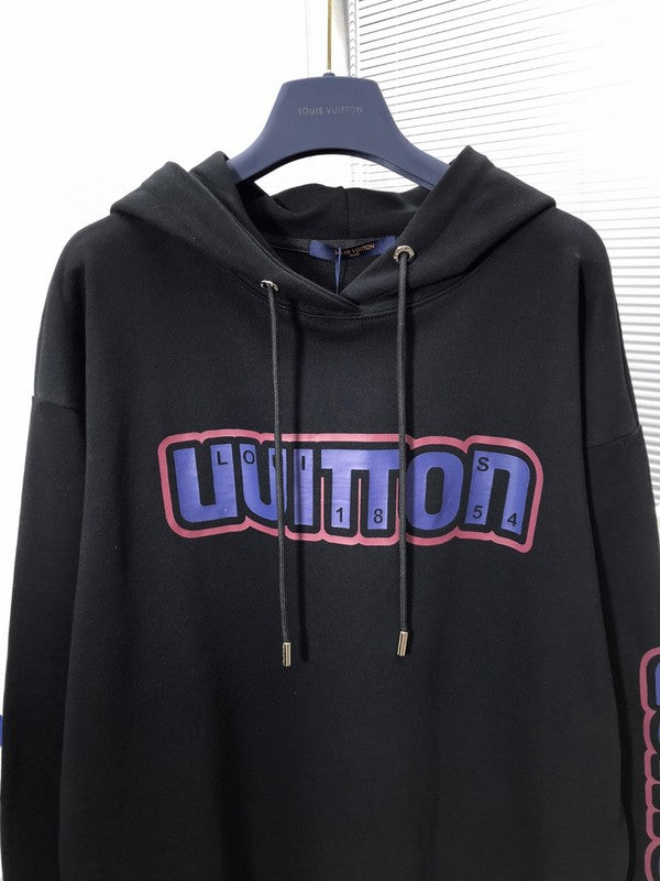 Flat lay presentation of Louis Vuitton luxury clothing with contemporary cut