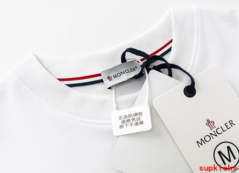 Full styled look of Moncler luxury clothing with monogram-inspired silhouette