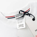 Full styled look of Moncler luxury clothing with monogram-inspired silhouette