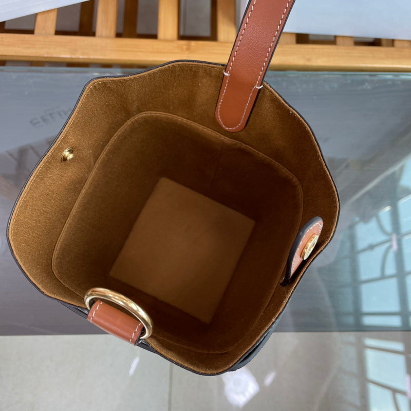 Back view of elevated signature women's handbag – women's luxury accessory