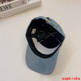 Close-up detail view of Louis Vuitton unisex cap
