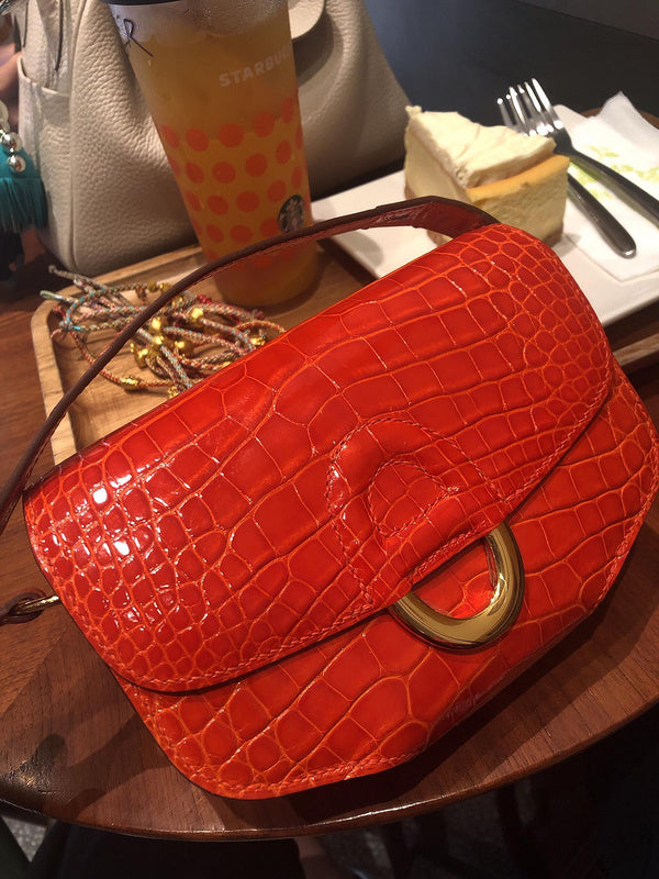 Side view of curated structured handbag