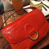 Side view of curated structured handbag