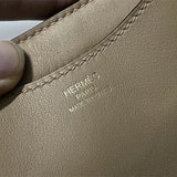  modern top-handle bag styled with outfit 12