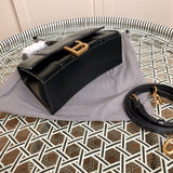 Back view of chic sleek women's handbag – women's luxury accessory