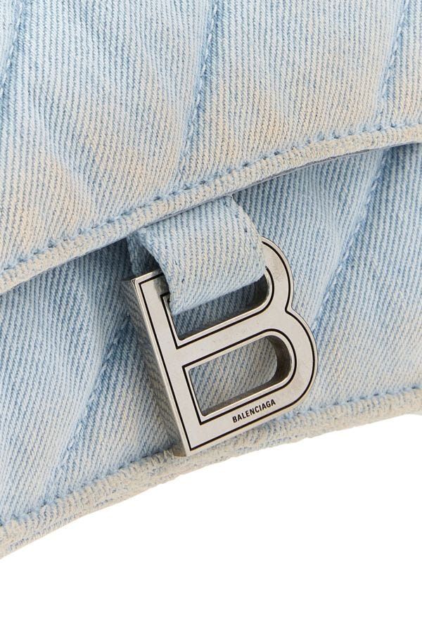 Close-up of Balenciaga crossbody hardware and fine stitching