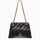 Close-up of Balenciaga shoulder bags hardware and fine stitching