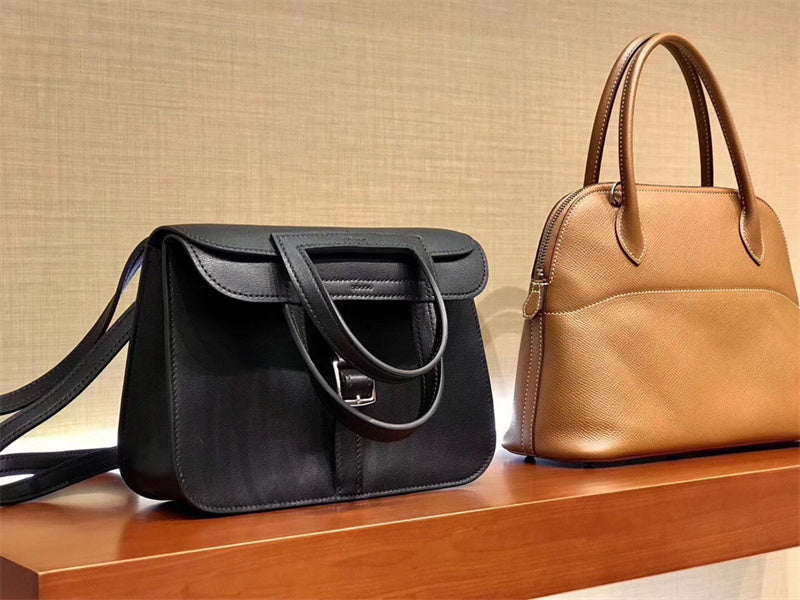 Side view of understated structured handbag