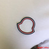 Back view of Moncler luxury clothing with contemporary cut
