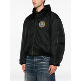 Close-up of Balenciaga jackets hardware and fine stitching