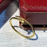 Close-up detail view of Cartier unisex jewelry piece