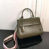 Side profile of structured signature women's handbag – women's premium purse