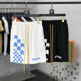 Close-up detail shot of Rhude luxury clothing with logo-detail design