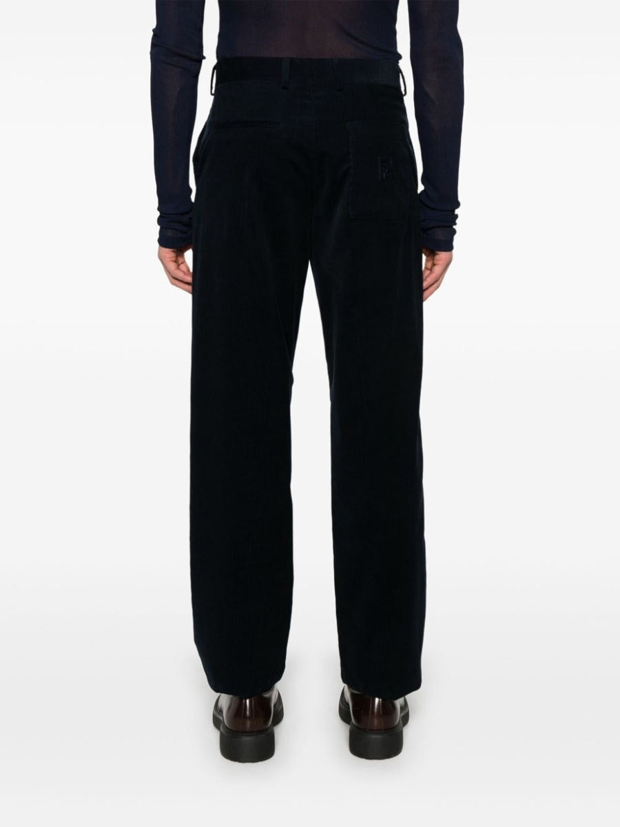 Close-up of Fendi pants hardware and fine stitching