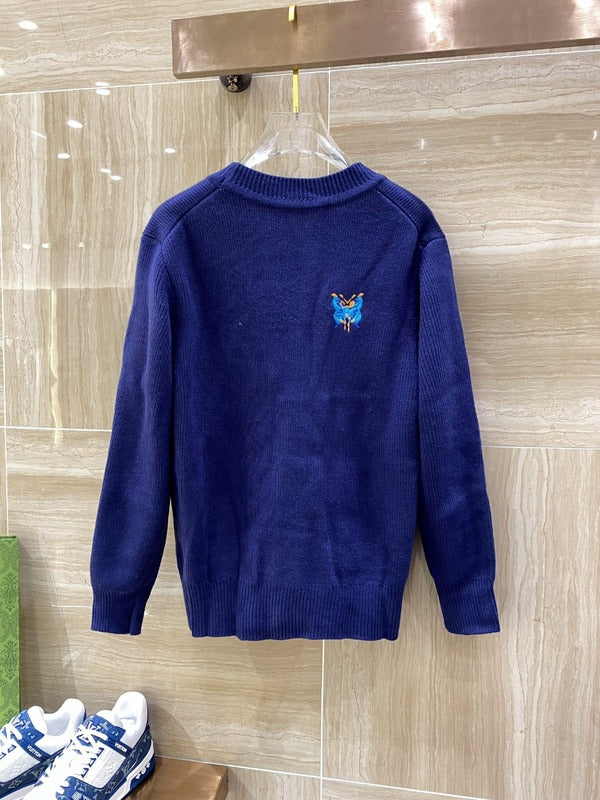 Side profile of Louis Vuitton luxury clothing with signature branding