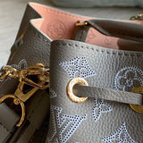  Curated satchel carried on shoulder