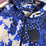 Flat lay presentation of Louis Vuitton luxury clothing with everyday silhouette