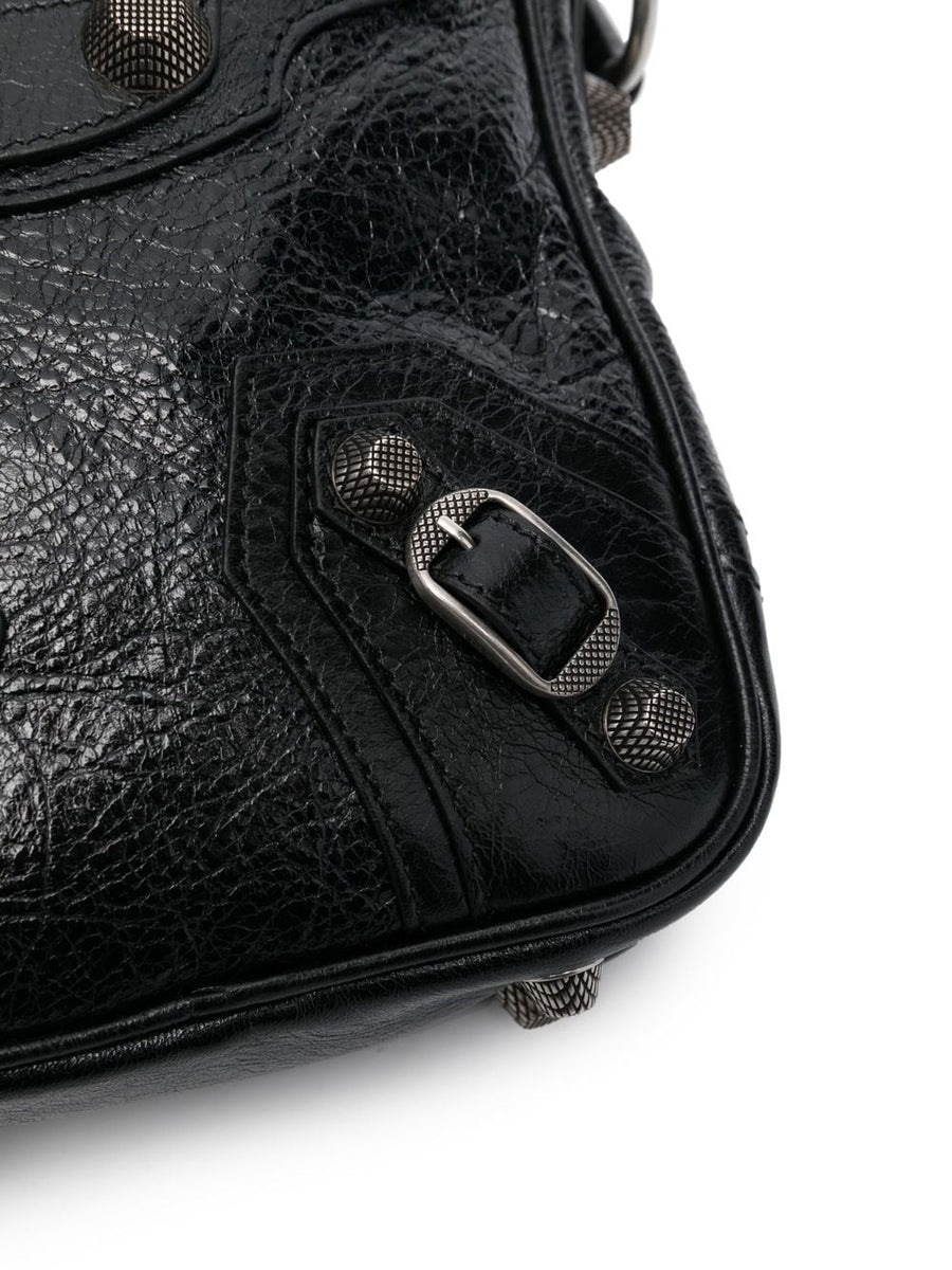 Close-up of Balenciaga handbags hardware and fine stitching