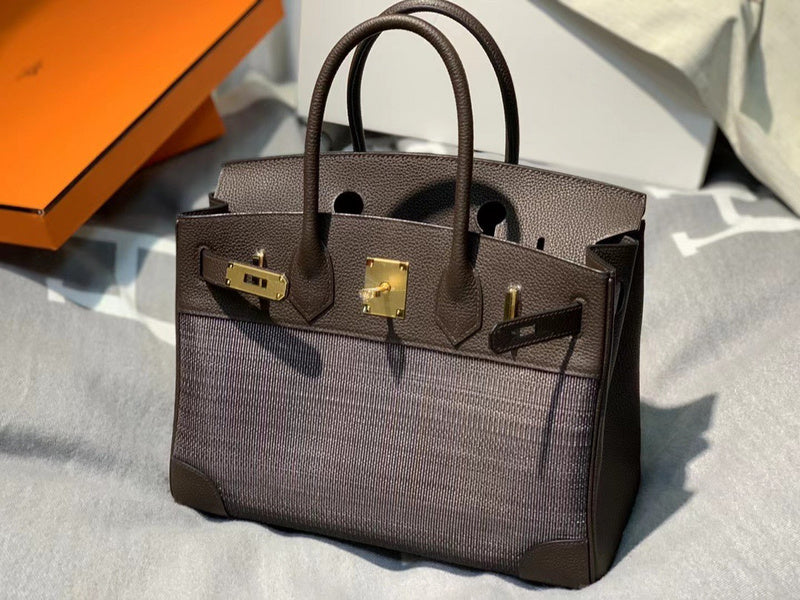 Side view of refined structured handbag