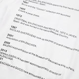 Close-up detail shot of Gucci luxury clothing with signature branding