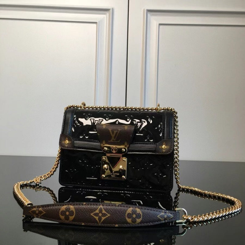 Front view of elevated refined women's handbag – women's luxury accessory