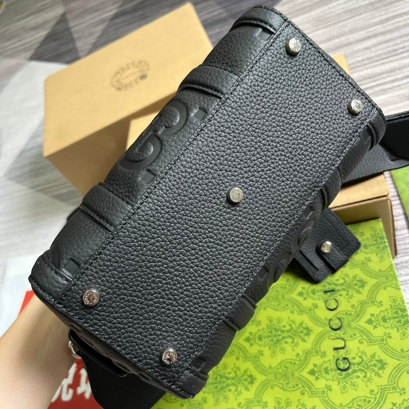 Styled lifestyle shot of polished structured women's handbag – women's statement bag