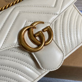 Back view of signature polished women's handbag – women's designer-style accessory