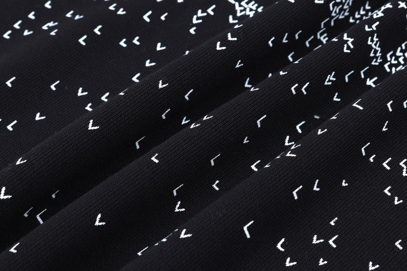 Flat lay presentation of Louis Vuitton luxury clothing with runway-inspired design