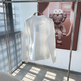 Full styled look of Gucci luxury clothing with monogram-inspired silhouette