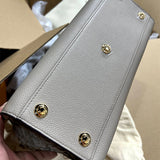  statement top-handle bag detail view showing craftsmanship