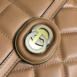 Close-up detail of classic polished women's handbag – women's designer-style accessory