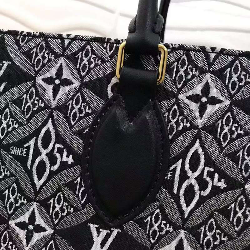 Back view of sleek elevated women's handbag – women's statement bag