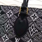 Back view of sleek elevated women's handbag – women's statement bag