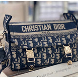 Side profile of structured signature women's handbag – women's designer-style accessory