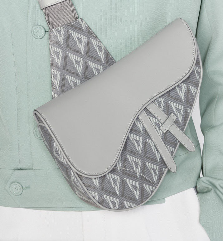 Styled lifestyle shot of sleek polished women's handbag – women's luxury accessory