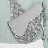 Styled lifestyle shot of sleek polished women's handbag – women's luxury accessory