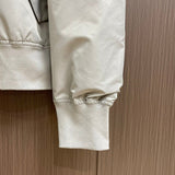 Back view of Louis Vuitton luxury clothing with label-forward styling