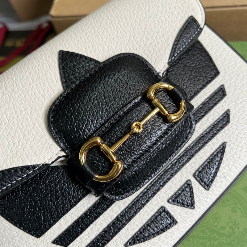 Styled lifestyle shot of classic sleek women's handbag – women's designer-style accessory