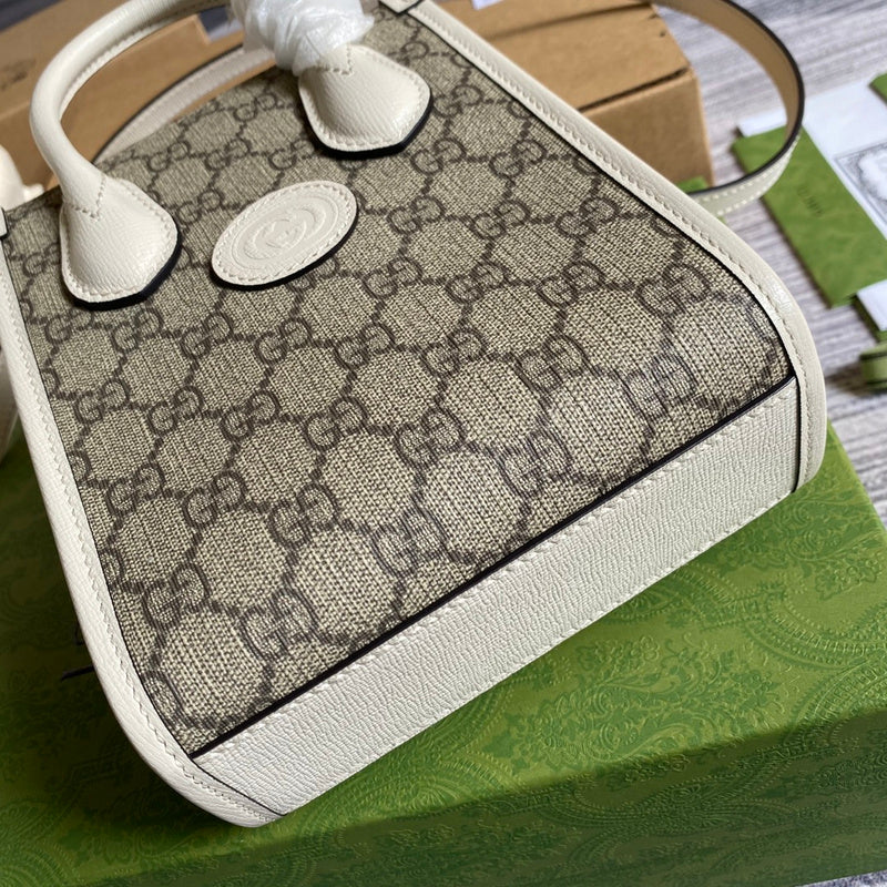 Styled lifestyle shot of refined signature women's handbag – women's statement bag