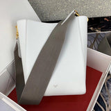 Side profile of classic modern women's handbag – women's luxury accessory